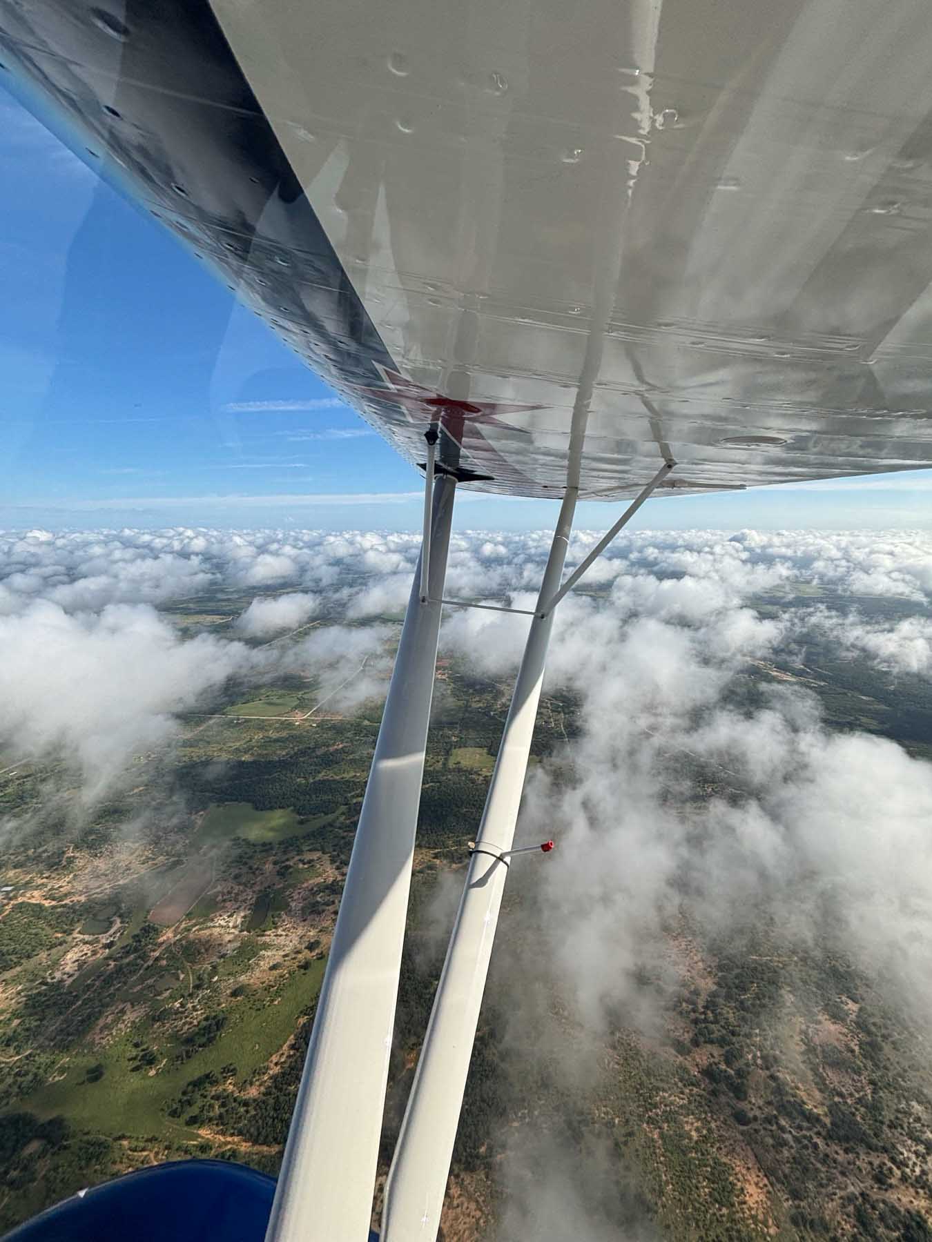 Super Decathlon N207JJ — aerial over the desert
