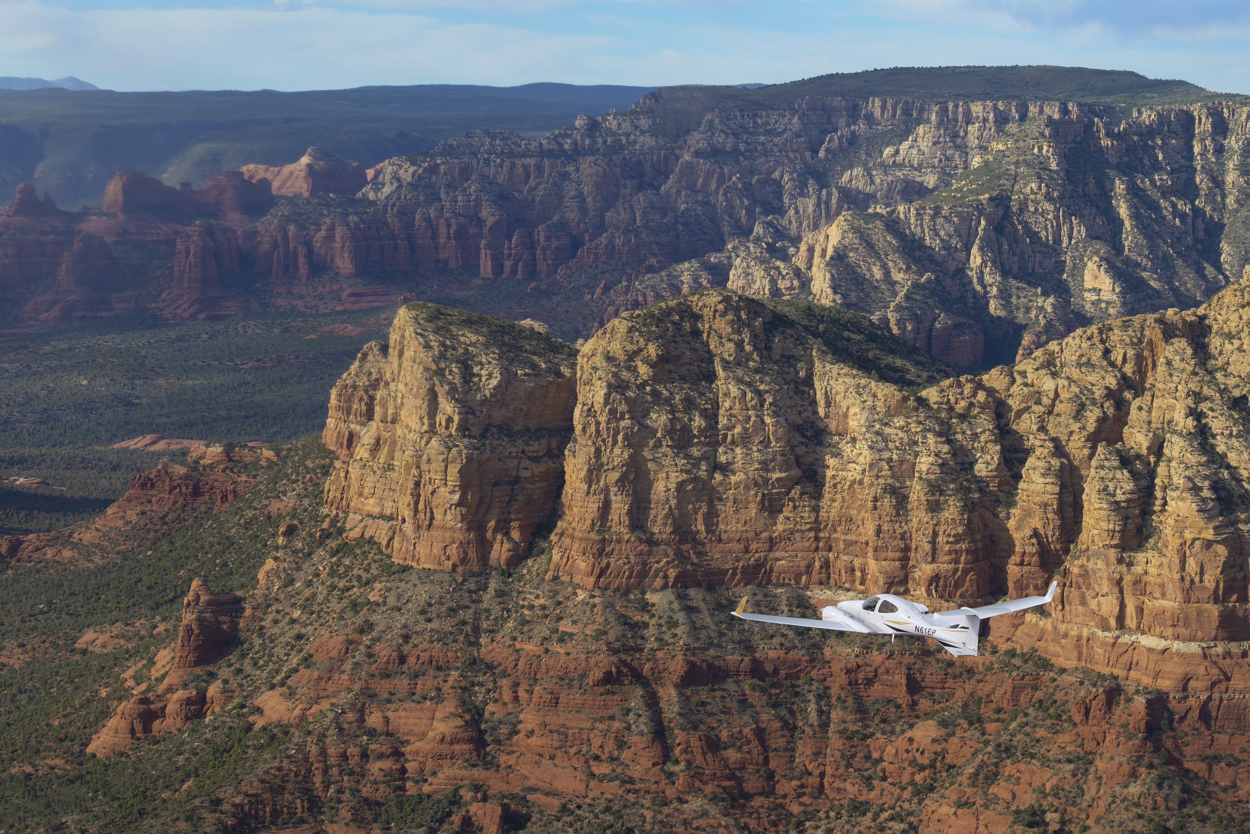 Diamond DA42 flying over Sedona red rock formations